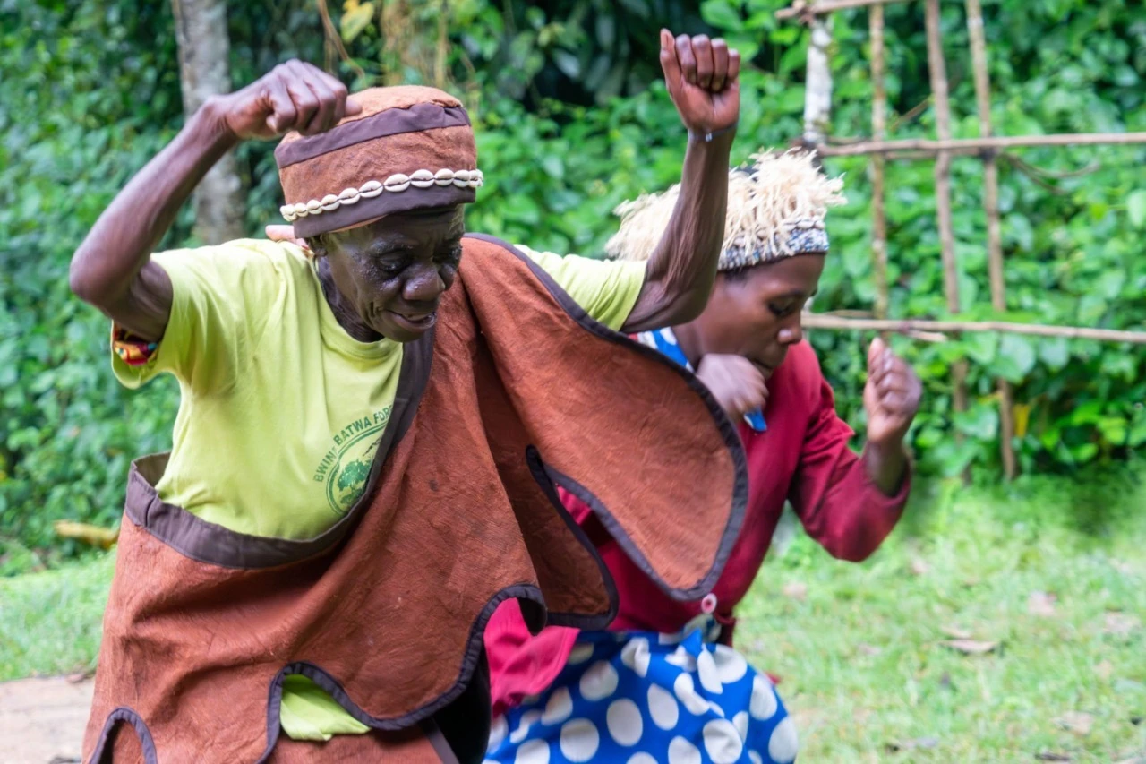 Uganda Batwa people performing traditional cultural dance during a Bwindi gorilla trekking safari