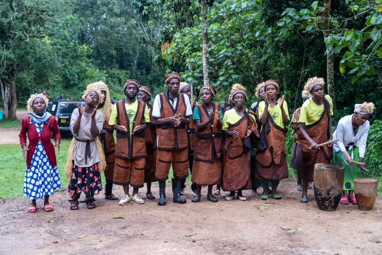 Batwa people performing a traditional cultural dance in Bwindi Impenetrable National Park, Uganda, showcasing indigenous heritage and community tourism.